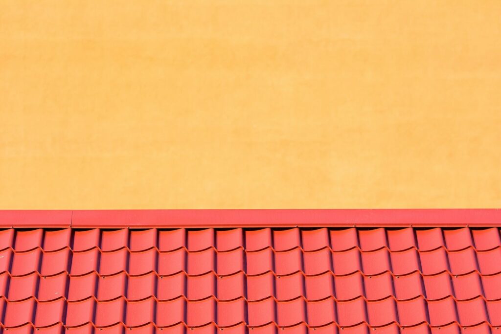 Orange Wall and Red Roofing